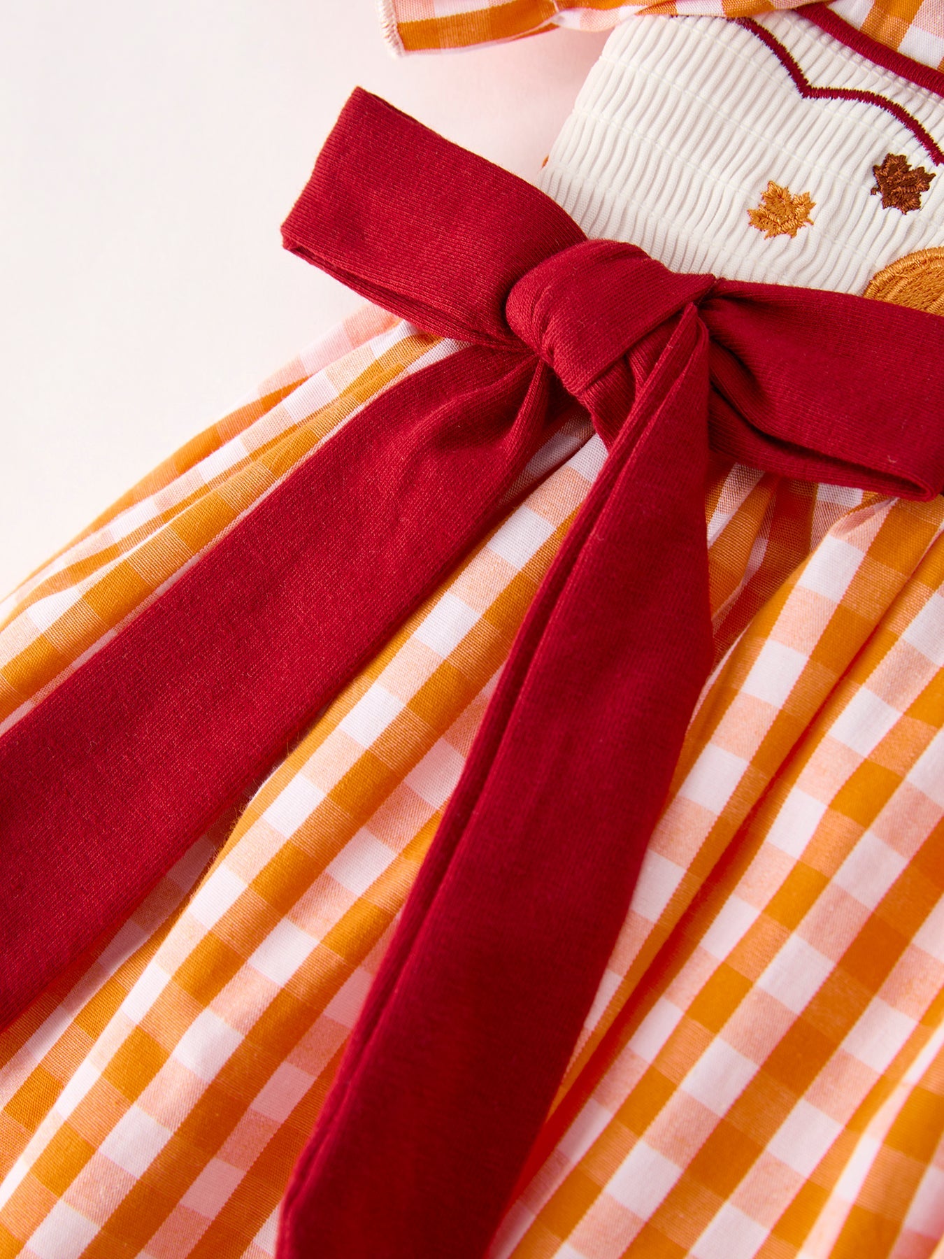 Girls Thanksgiving Smocked Embroidered Dress | Orange Gingham with Red Bows