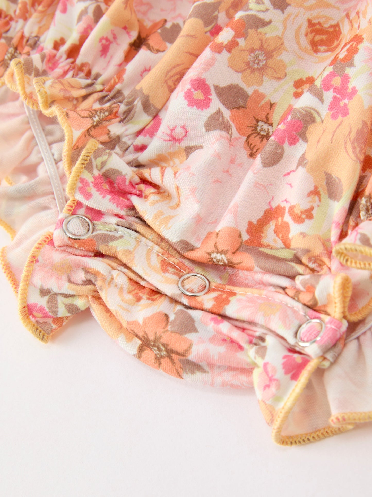 Baby Girls Peach Floral Smocked Bubble Romper | Bow Shoulder Puff Sleeve