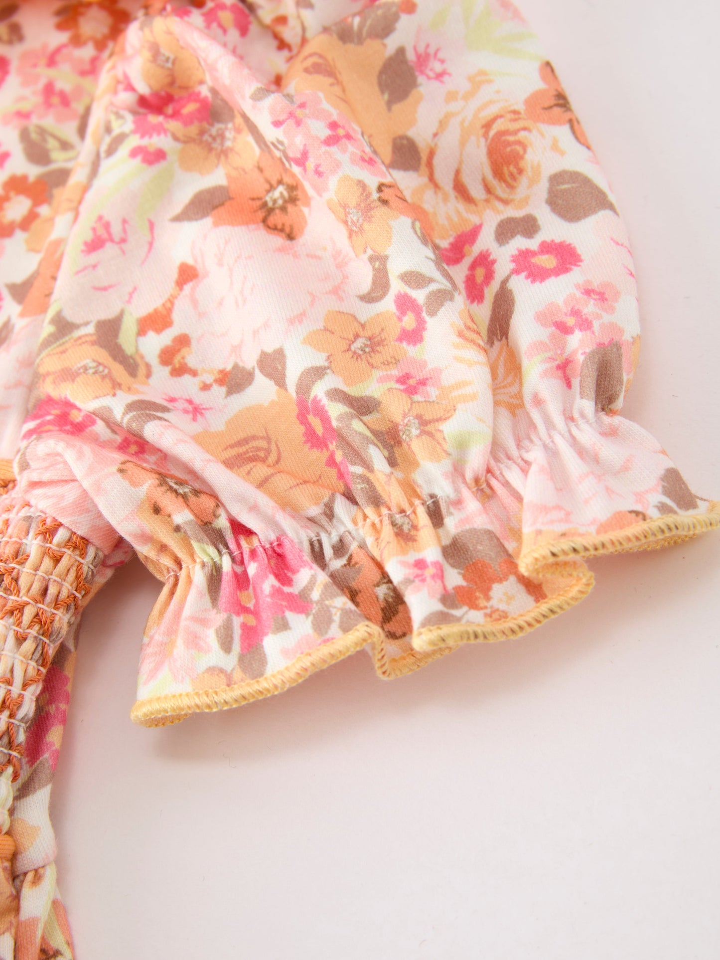 Girls Peach Floral Smocked Dress | Bow Shoulder Puff Sleeve Boutique