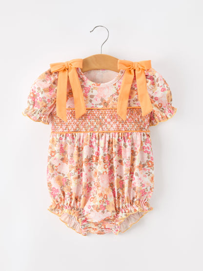 Baby Girls Peach Floral Smocked Bubble Romper | Bow Shoulder Puff Sleeve
