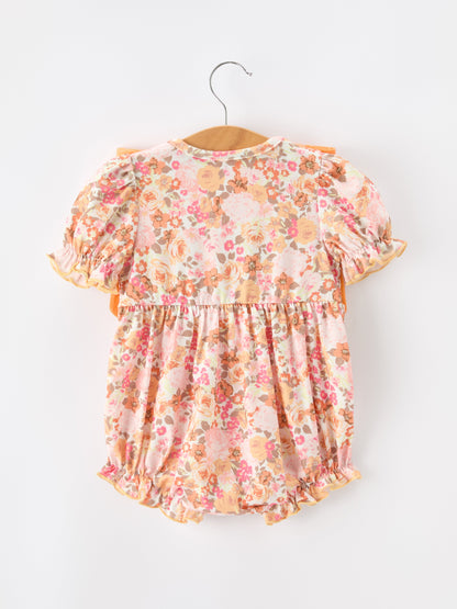 Baby Girls Peach Floral Smocked Bubble Romper | Bow Shoulder Puff Sleeve
