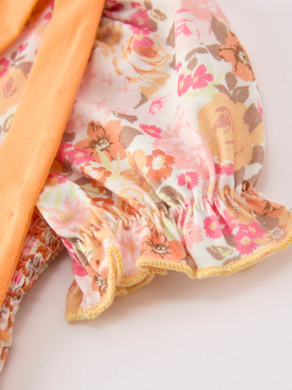 Baby Girls Peach Floral Smocked Bubble Romper | Bow Shoulder Puff Sleeve