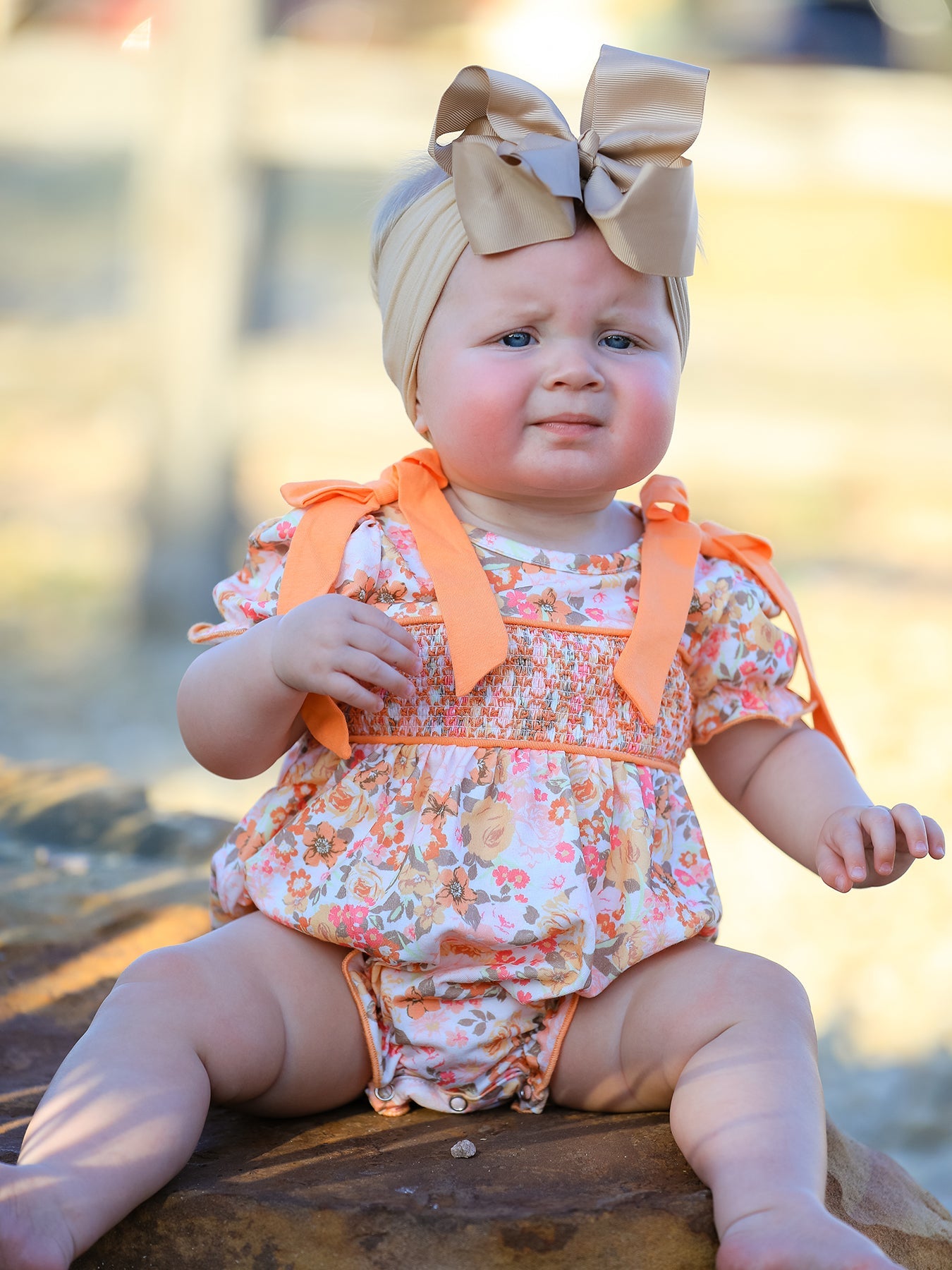 Baby Girls Peach Floral Smocked Bubble Romper | Bow Shoulder Puff Sleeve
