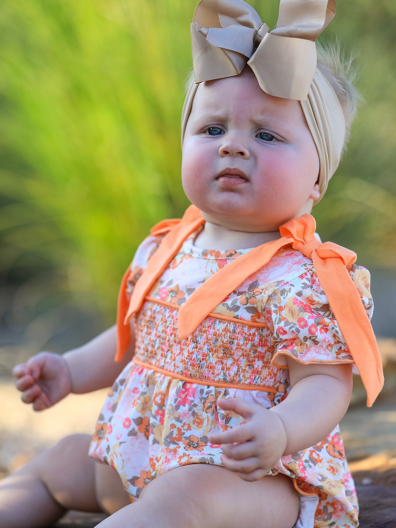Baby Girls Peach Floral Smocked Bubble Romper | Bow Shoulder Puff Sleeve