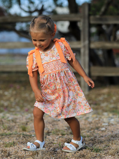 Girls Peach Floral Smocked Dress | Bow Shoulder Puff Sleeve Boutique